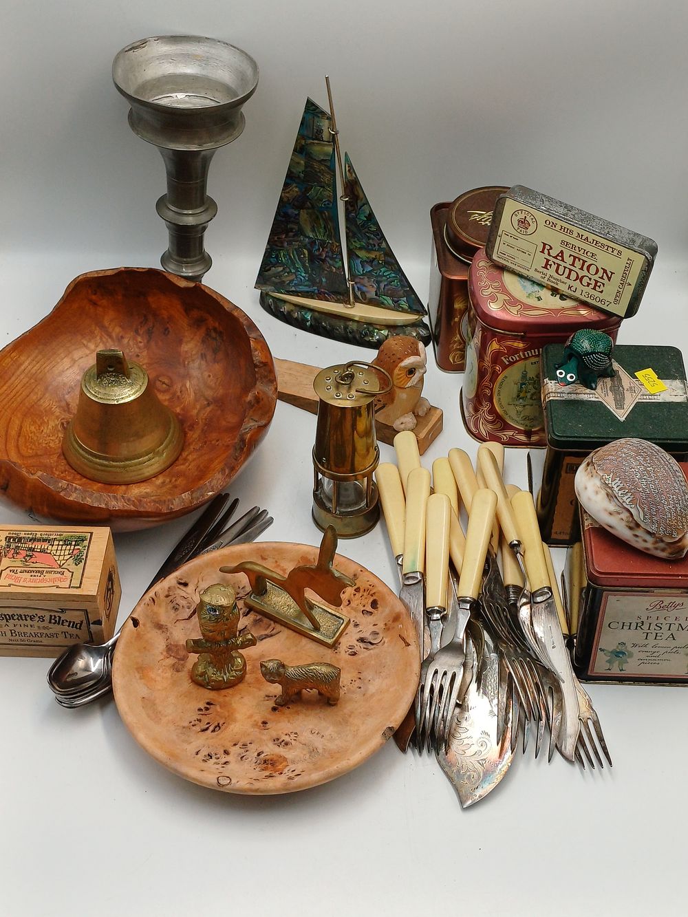 Lot 951: A Collection of British Tins, White Metal Cutlery, and Decorative Objects
