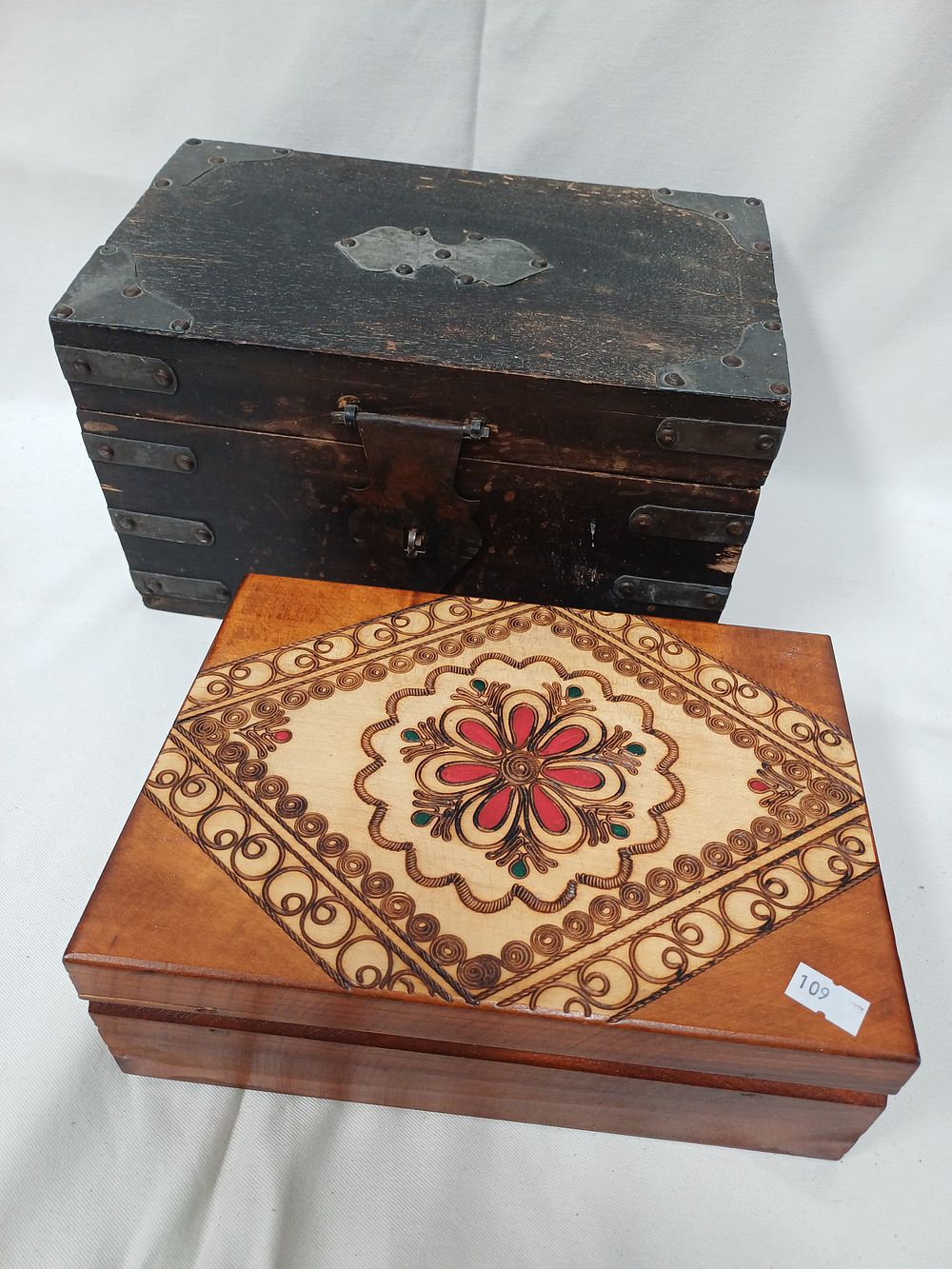 Lot 964: Two Folk Art? Wood Caskets including a Pyrography Example