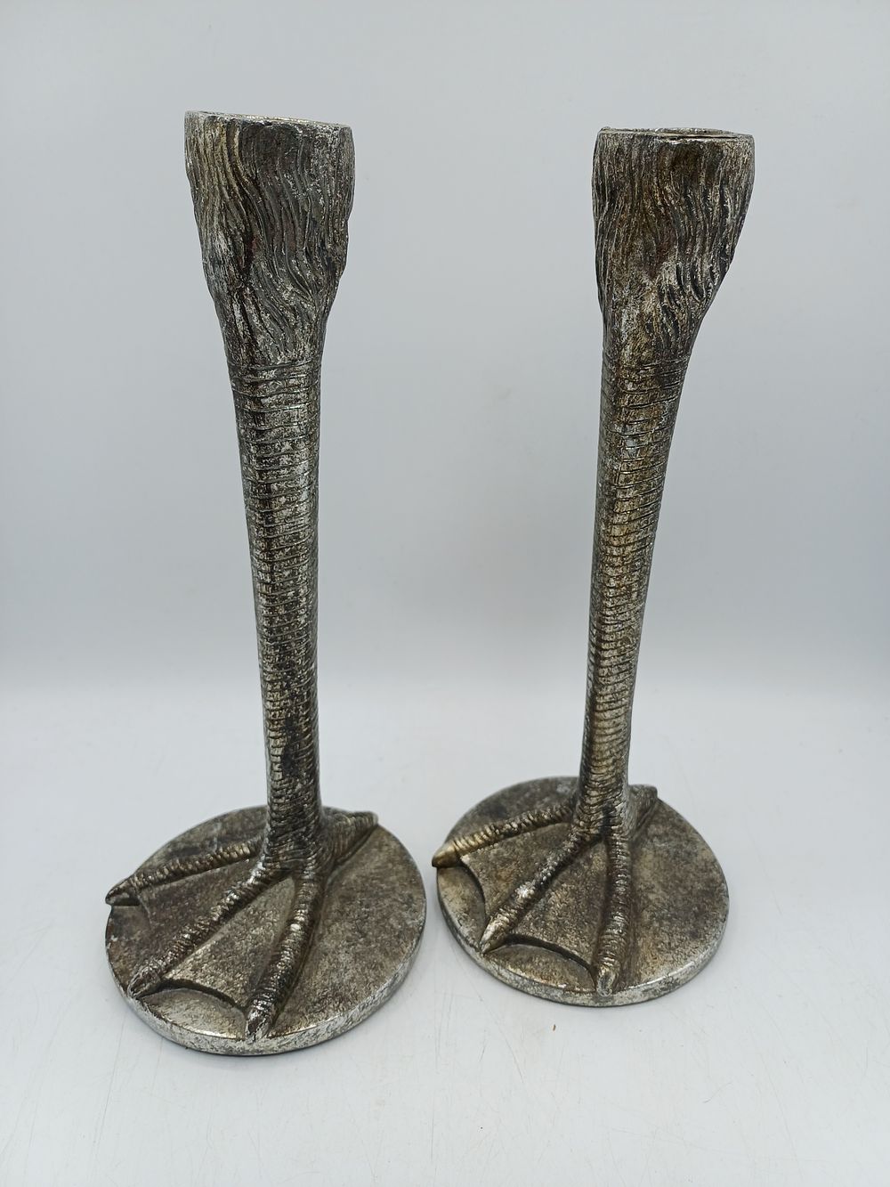 Lot 967: A Pair of White Metal Novelty Bird Leg Candlesticks, 10"