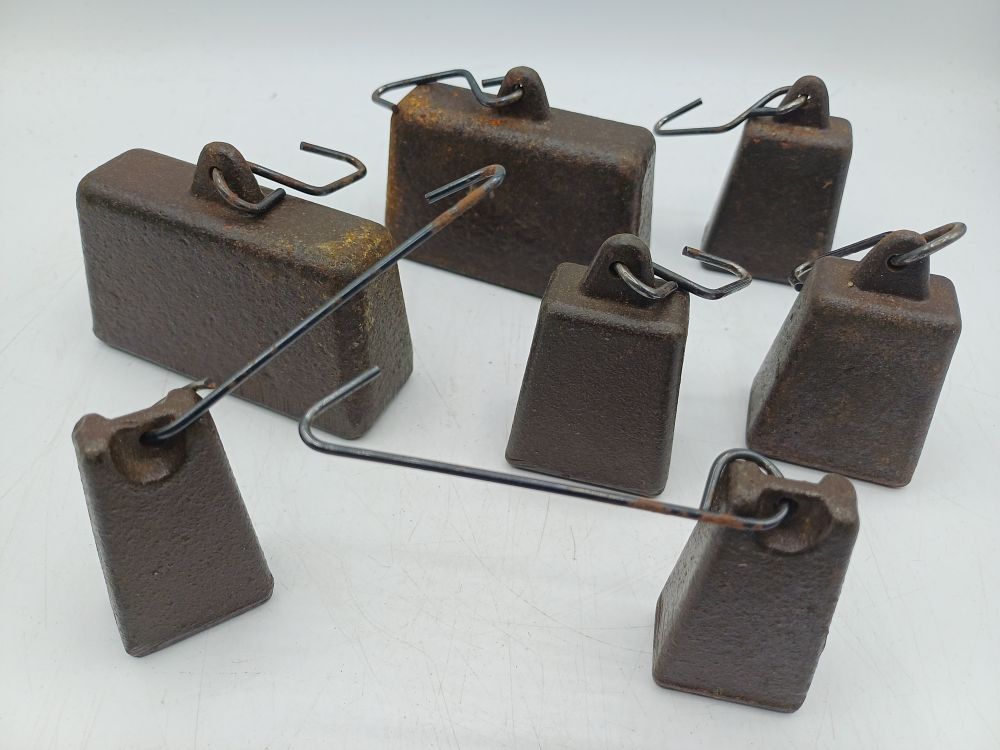 Lot 990: A Group of Cast Iron Steelyard Scale Weights