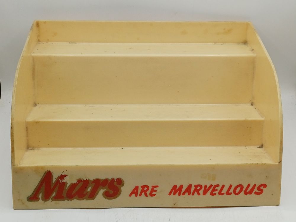 Lot 992: Mid-20th Century Mars Promotional Plastic Three-Tier Display Stand, 13"