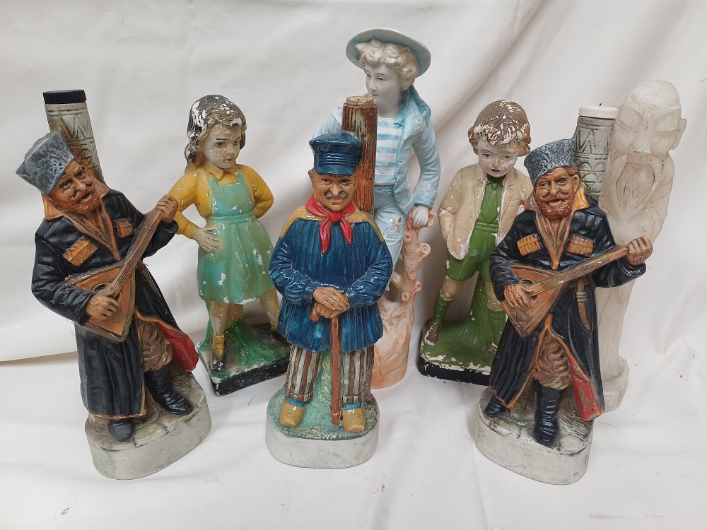 Lot 1004: A Collection of Ceramic and Bisque Figural Flasks and Souvenir Ornaments, 12"