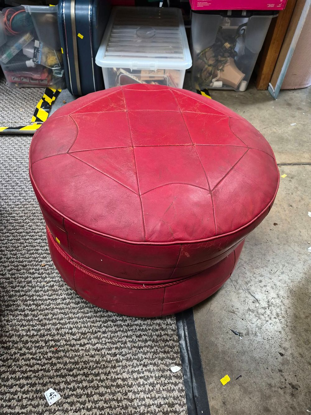 Lot 1056: A Moroccan? Stitched Leather Circular Pouffe, 22"
