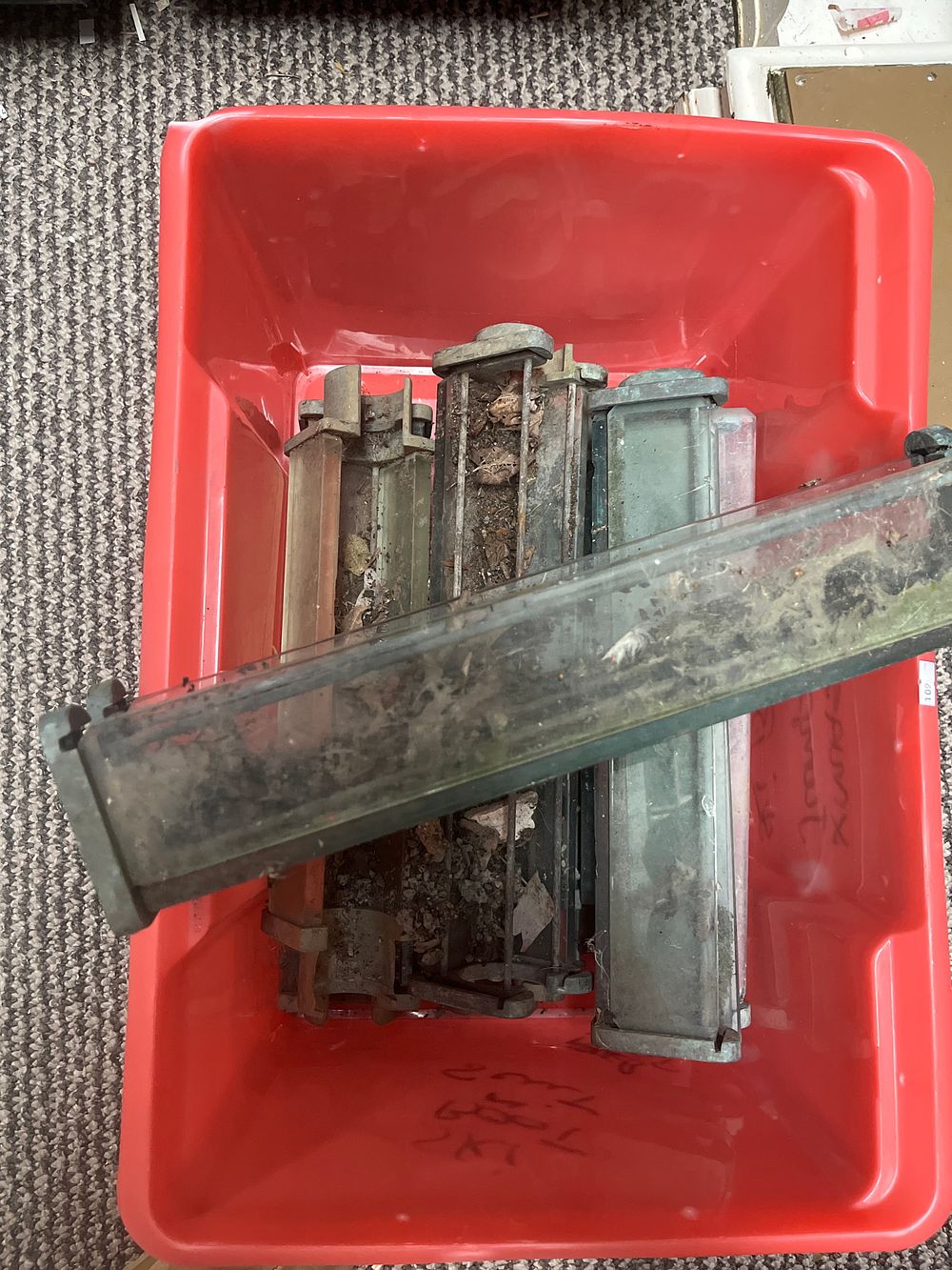 Lot 1072: An Assortment of Industrial? Metal and Glass Greenhouse Vent Actuators
