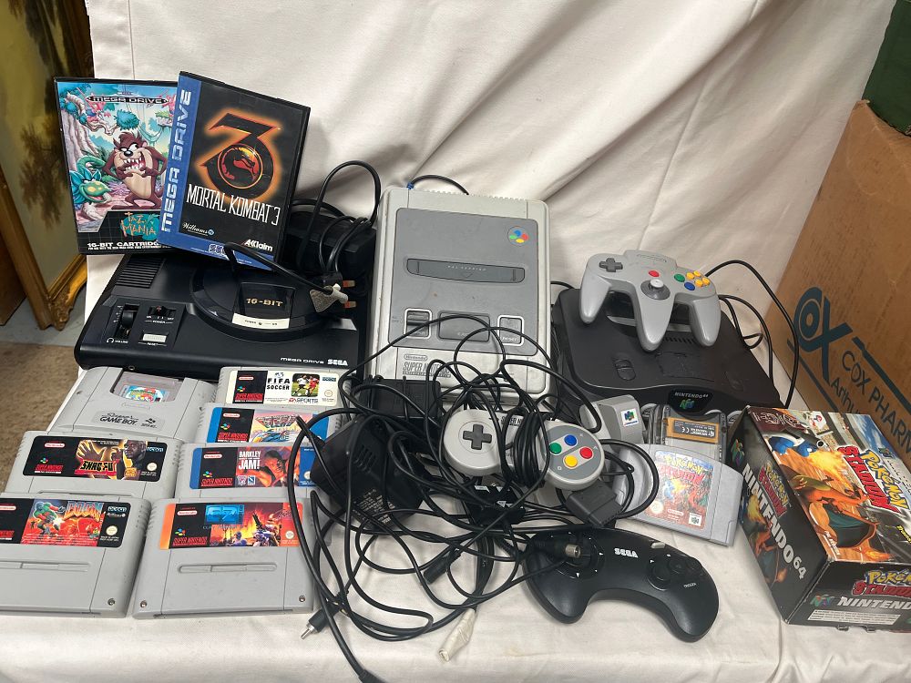Lot 1073: A Collection of Sega and Nintendo Home Video Game Consoles and Software