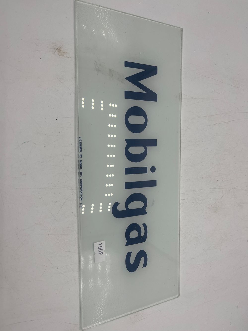 Lot 1083: Mobilgas Licensed Rectangular Glass Gas Pump Ad Sign Panel, 12” x 5”