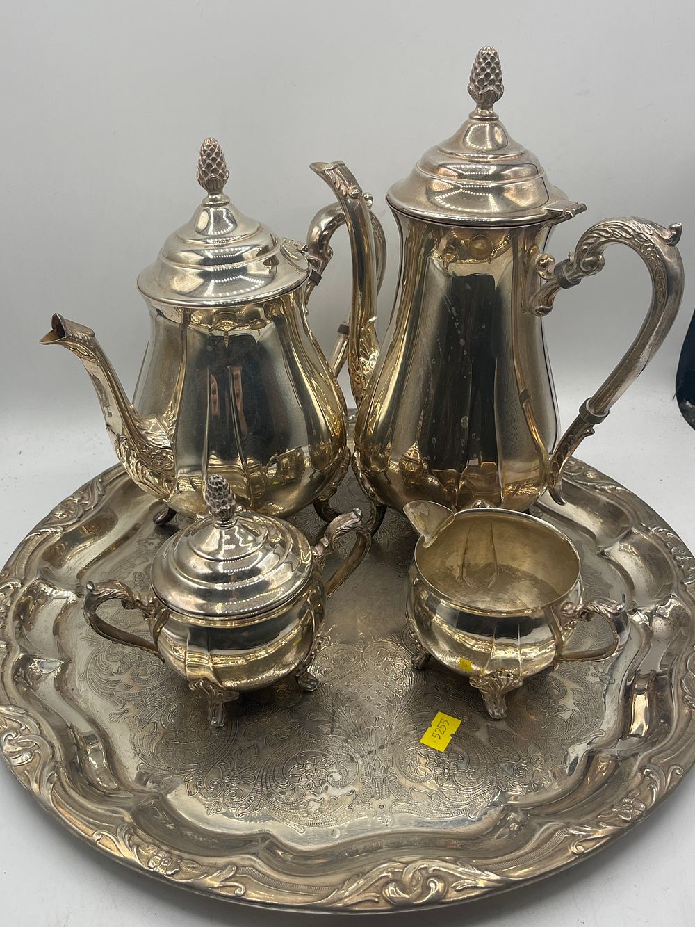 Lot 1087: A Rococo Revival White Metal Tea and Coffee Service by Viners? Sheffield