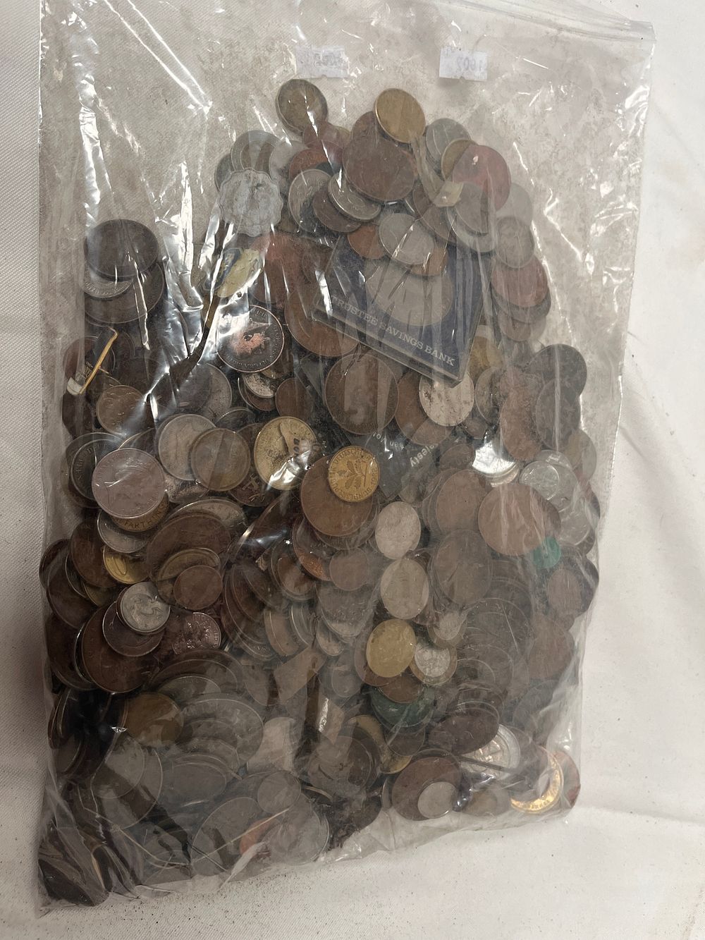 Lot 1107: A Collection of British and International Base Metal and White Metal Coins
