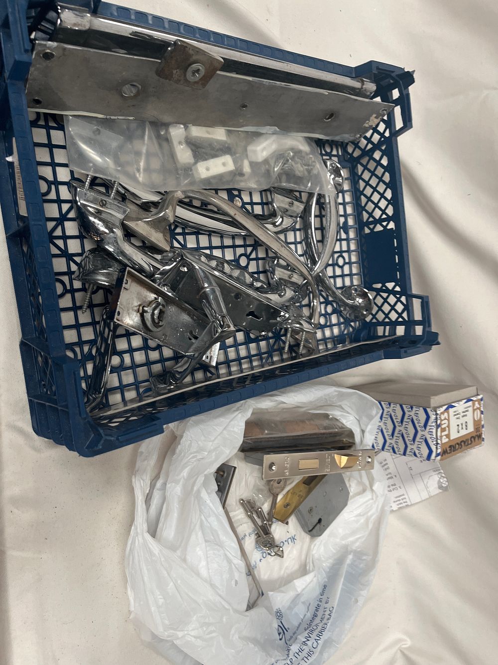 Lot 1110: A Collection of Legge White Metal Door Hardware and Nettlefolds Wood Screws