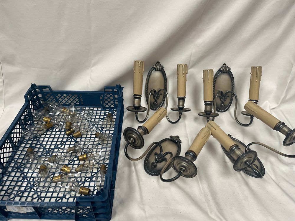 Lot 1121: An Assortment of Antiqued White Metal Effect Electric Wall Sconces