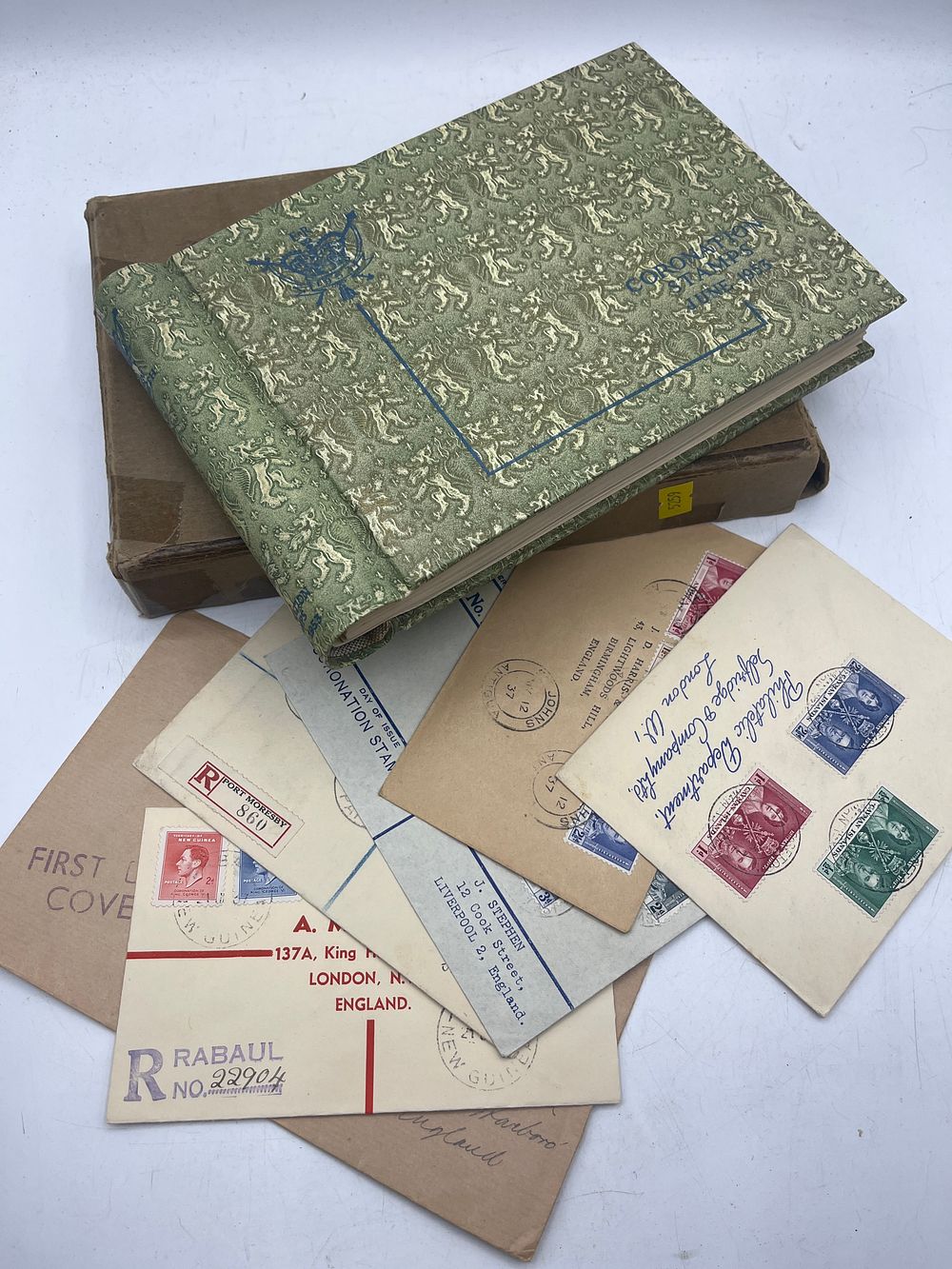 Lot 1132: UK Commonwealth 1953 Queen Elizabeth II Coronation Stamp Album and 1937 FDCs