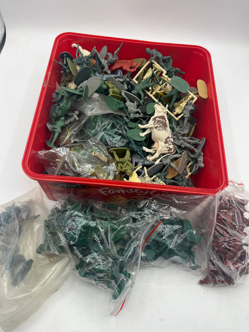 Lot 1140: A Group of Plastic Military and Farm Animal Figurines