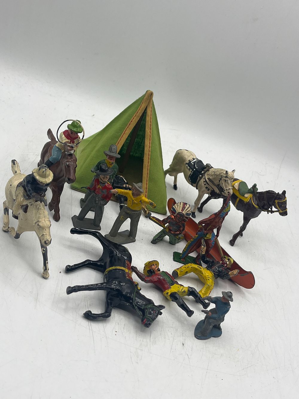 Lot 1141: A Collection of Hollow-Cast Lead Wild West Figures and Fabric Tent