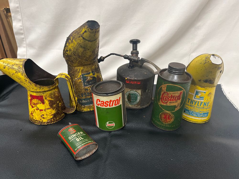 Lot 1148: A Collection of Mid-20th Century Tin-Plate Automobilia and Household Oil Containers