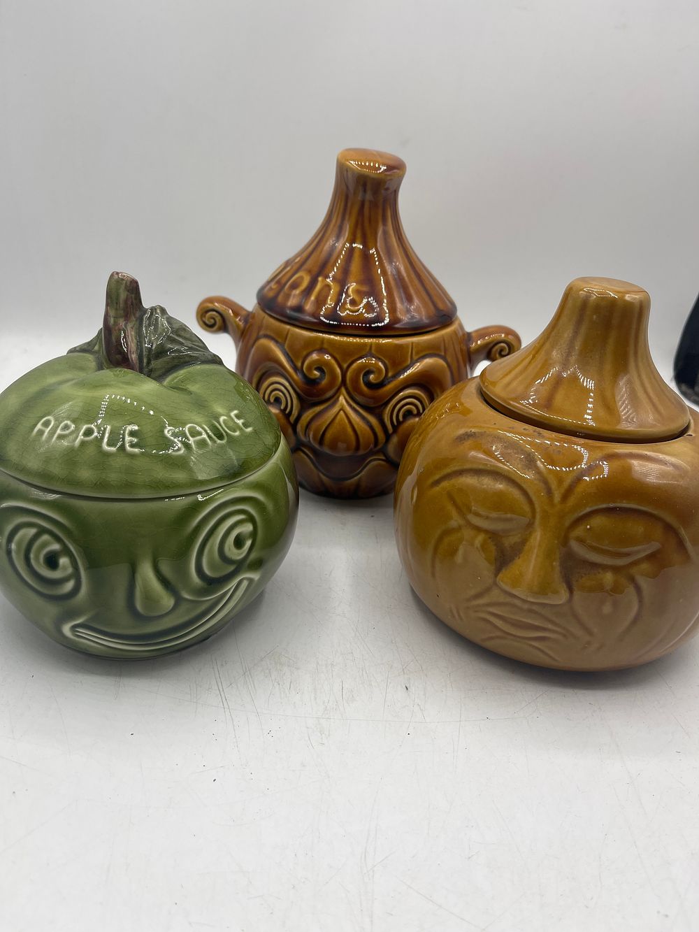 Lot 1152: A Trio of English Earthenware Condiment Jars by SylvaC and Sadler