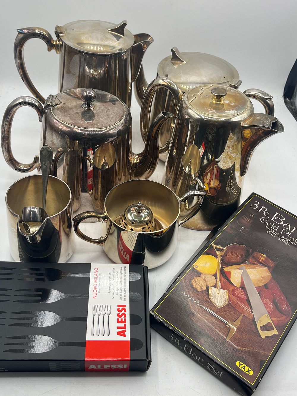 Lot 1173: A Collection of White Metal Tableware and Boxed Accessories by Alessi and Yax