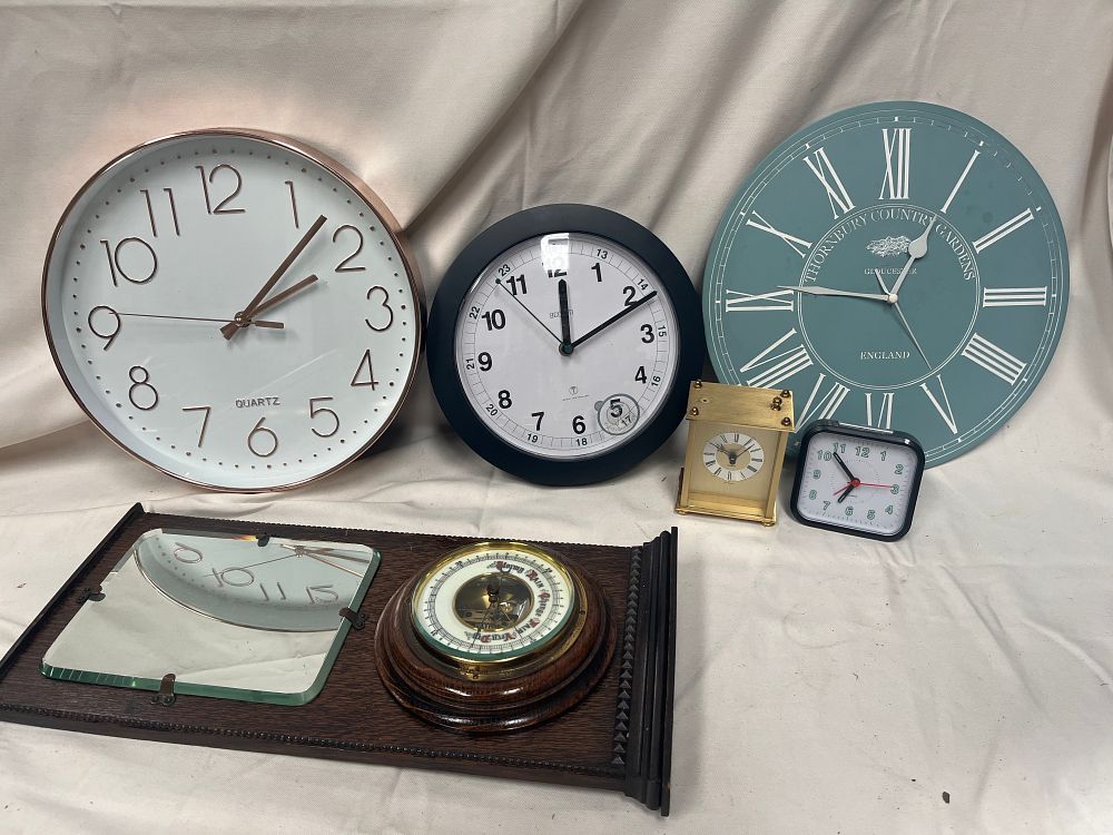 Lot 1176: An Assortment of Quartz Wall and Mantel Clocks and a Barometer