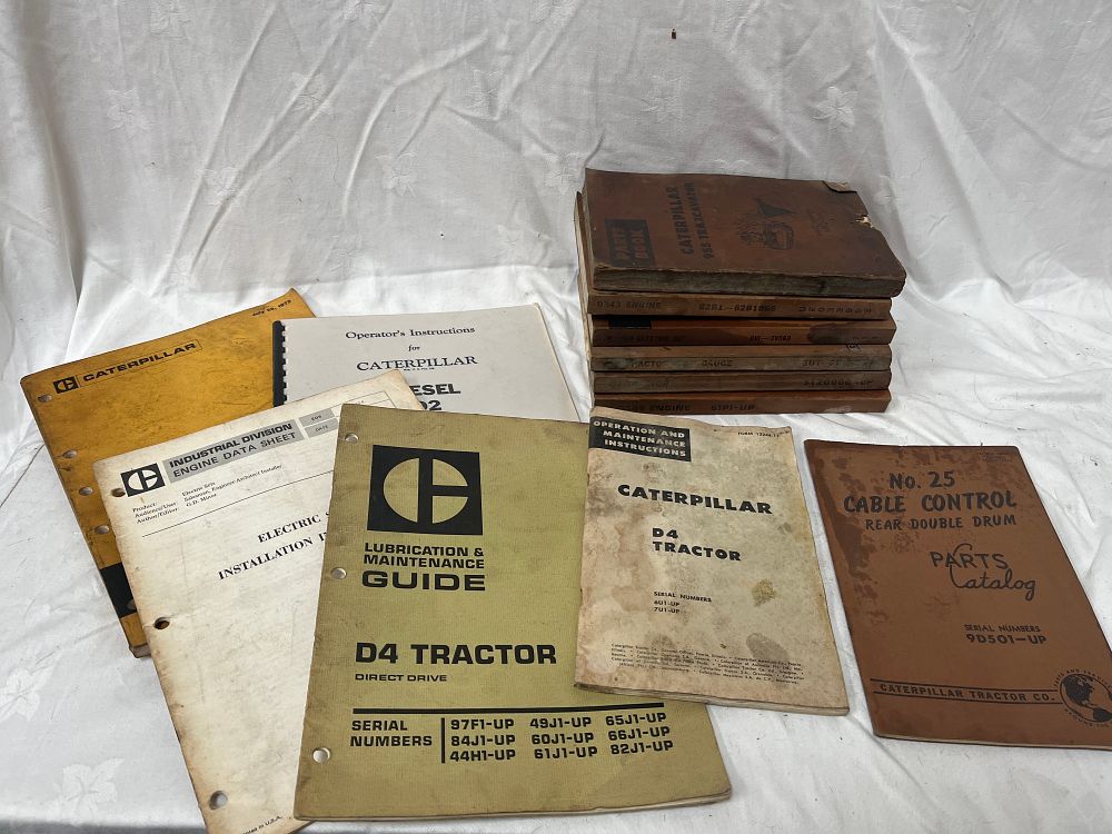 Lot 1191: Caterpillar Group of Heavy Machinery Parts Books and Maintenance Guides