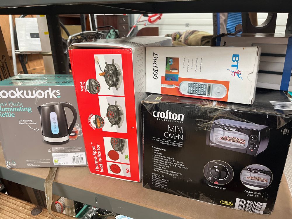 Lot 1215: An Assortment of Boxed Small Household Appliances Including Tefal and BT