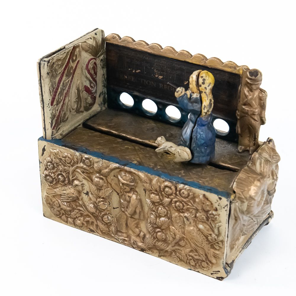 Perfection Registering Cast Iron Mechanical Bank. Made by J&E Stevens Co., the Perfection 