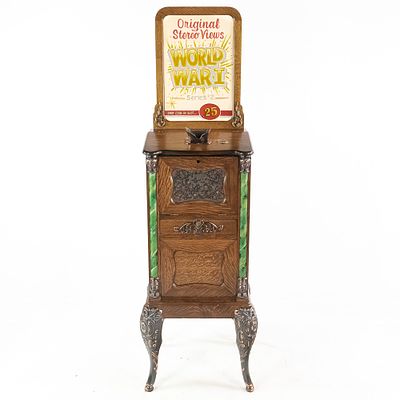 Restored Caille Bros "The Cail-O-Scope" Mutoscope. The cabinet is made of quarter sawn oak 