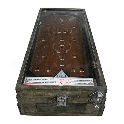 Early 1930s Countertop Mechanical Pin Game. Machine. This 1930s mechanical game features a 
