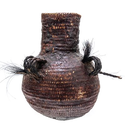 1920s Apache Water Vessel. This circa 1920s Apache Tus water vessel showcases the ingenuity and 