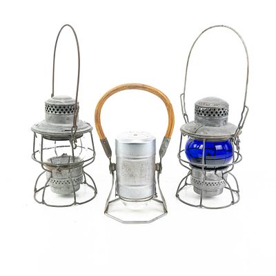 (3) Antique Railroad Lanterns. This is a phenomenal grouping of three vintage railroad lanterns 