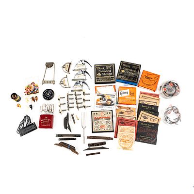 Assortment of Vintage Guitar Strings & Parts. Collection features an assortment of vintage 