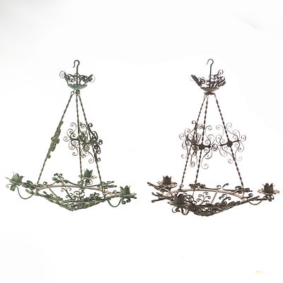 (2) French Wrought Iron Candle Chandeliers. A pair of very ornate metal candle hanging 