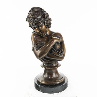 Bronze Bust Of A Bare Breast Woman. No artist or foundry marks. In VG+ condition on a marble 