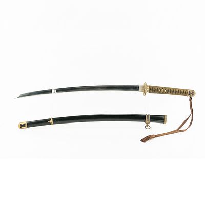 Late to Postwar Japanese Army Sword. BLADE: Not signed, with Stainless steel blade. Tang has 