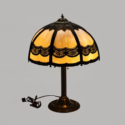 Miller Slag Glass Table Lamp. This table lamp features a domed shade composed of eight cream and 