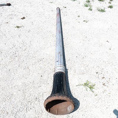 Antique Street Light. This antique street light consists of 2 pieces of heavy cast iron. The 