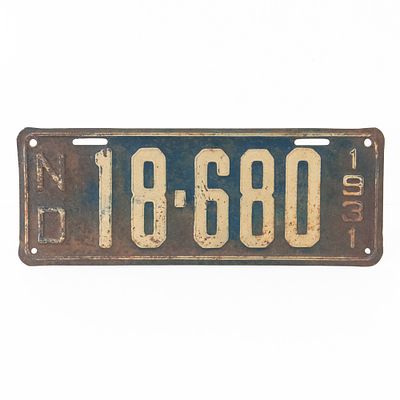 North Dakota 1931 License Plate. # 18-680 in good condition with paint fade and light surface 