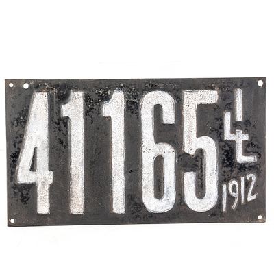 Illinois 1912 License Plate. # 41165 in good condition with the numerals possibly being touched 