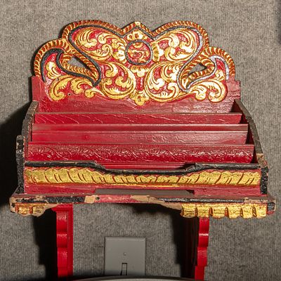 Chinese Theme Literature Holder. This striking wall-mounted shelf showcases the vibrant artistry 
