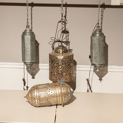 Moroccan Style Filigree Brass Lanterns (4). This exquisite collection features four 