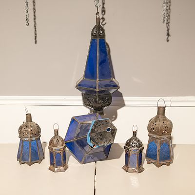 Six Moroccan Style Blue Glass Lanterns (6). This striking collection of six Moroccan-style 