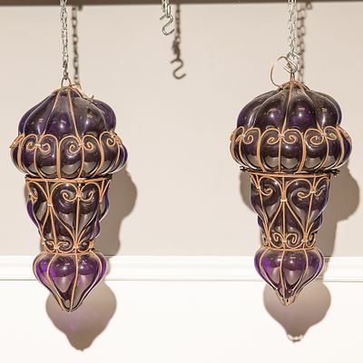 Large Purple Blown Glass Lanterns (2)
W/Rods(2). These striking Moroccan-style "onion" lanterns 