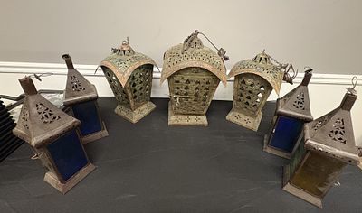 Seven Ornate Moroccan Style Lantern Collection (7). This impressive seven-piece assembly 