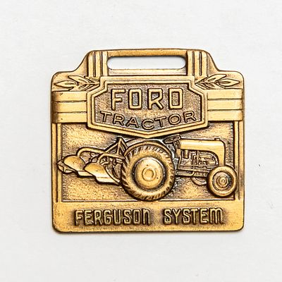 Vintage Watch FOB - FORD TRACTOR FERGUSON SYS. Pre-owned. Dents, dings, scratches and other 