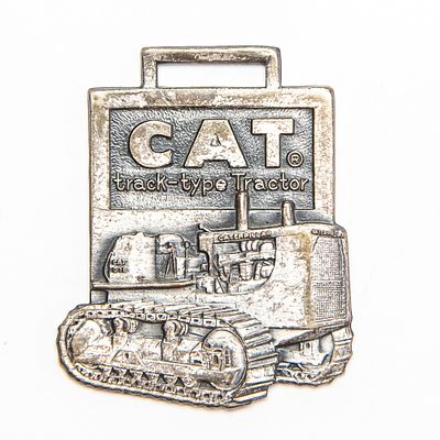 Vintage Watch FOB - CAT TRACK TYPE TRACTOR-PATTEN. Pre-owned. Dents, dings, scratches and other 