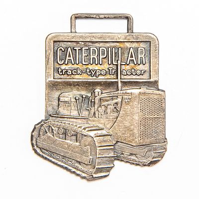 Vintage Watch FOB - CATERPILLAR TRACK TYPE TRACTOR. Ohio Machinery Co. Pre-owned. Dents, dings 