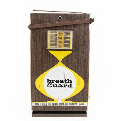 Coin Op Breath Guard Toothbrush Vending Machine. An unusual, seldom seen, coin operated tooth 