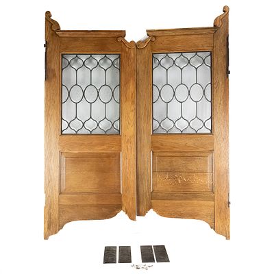 Pair of "Bruswick" Oak/Glass Saloon Doors. These are the real thing. Ornate oak set of swinging 