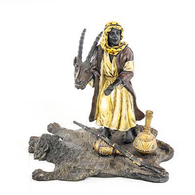 Bergman Bronze Arab Hunter on Lion Rug. This is an exceptional late 19th to early 20th-century 