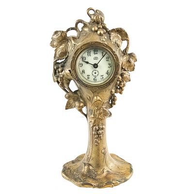 Art Nouveau Spelter Grapevine Clock. This is a quintessential Art Nouveau desk clock, likely 
