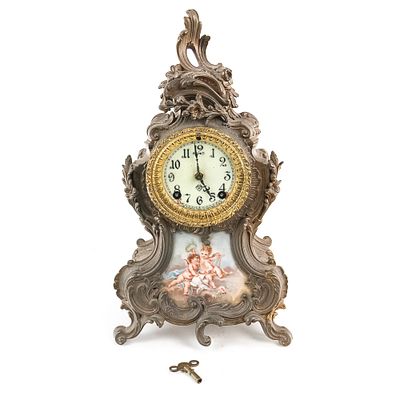 Ansonia Rococo Spelter & Porcelain Clock. This late 19th-century Victorian mantel clock 