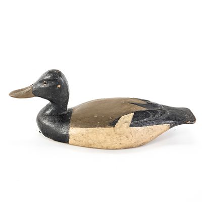 Antique Hand-Carved Wooden Duck Decoy. This mid-century hand-carved wooden duck decoy represents 